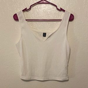 Notched neck solid tank top